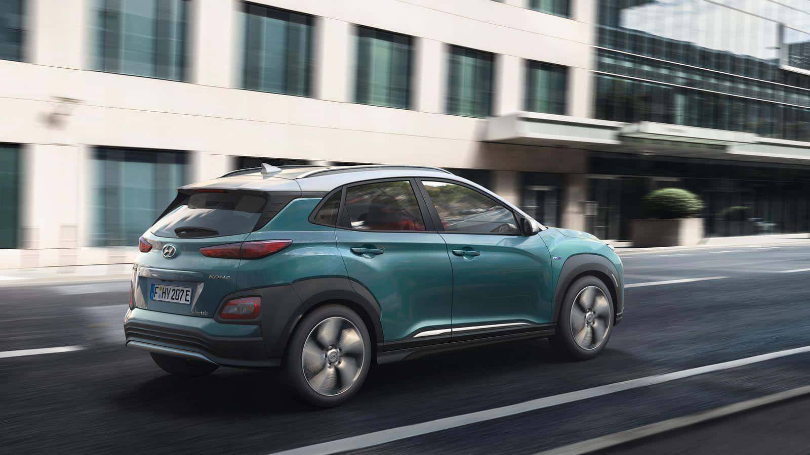 Sleek And Stylish Hyundai Kona On The Road Wallpaper