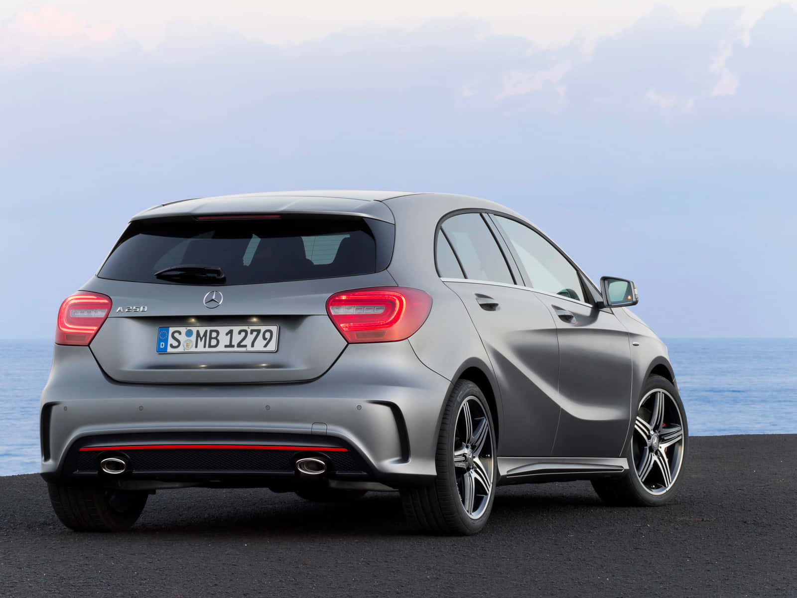 Sleek And Stylish Mercedes Benz A-class On The Road Wallpaper