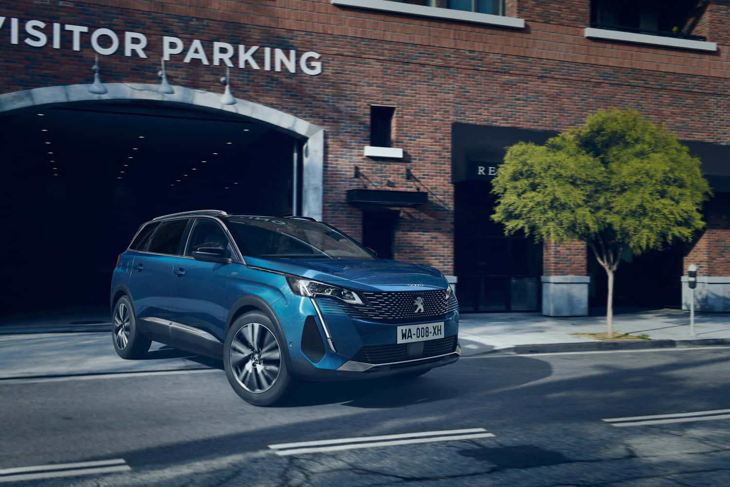 Sleek And Stylish Peugeot 5008 On Open Road Wallpaper