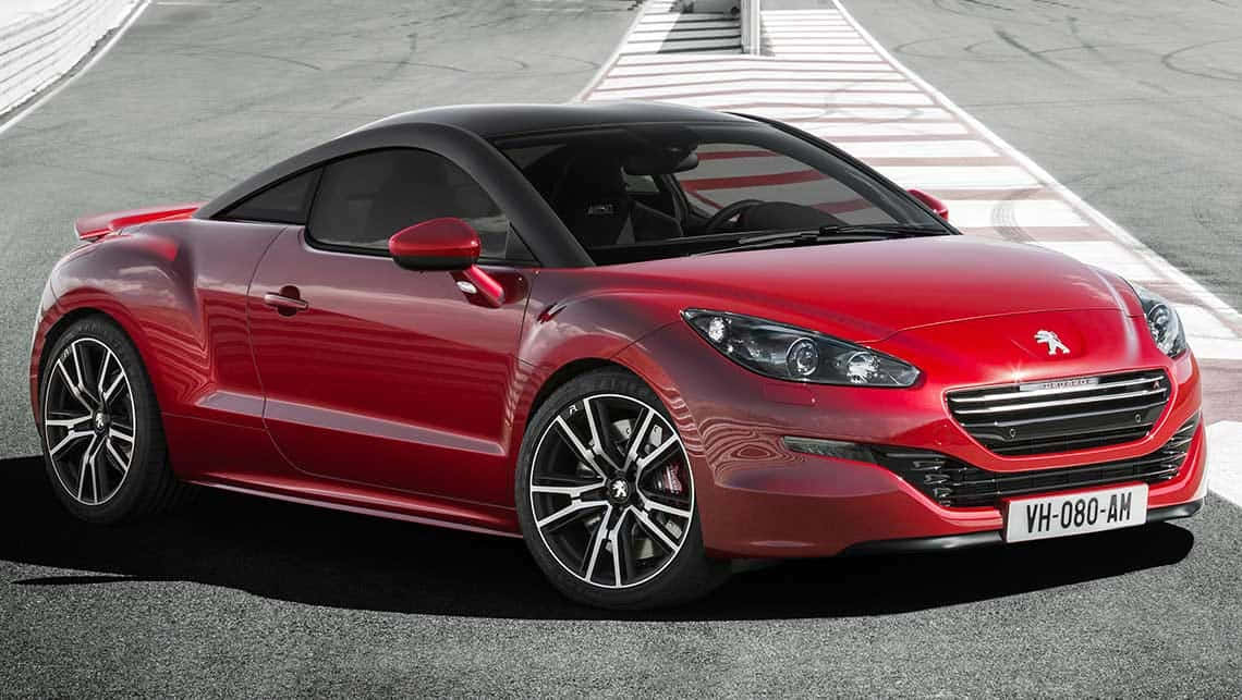 Sleek And Stylish Peugeot Rcz, Gleaming Under The Sunlight. Wallpaper