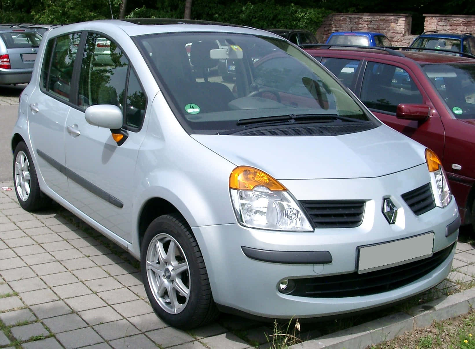 Sleek And Stylish Renault Modus On The Road Wallpaper