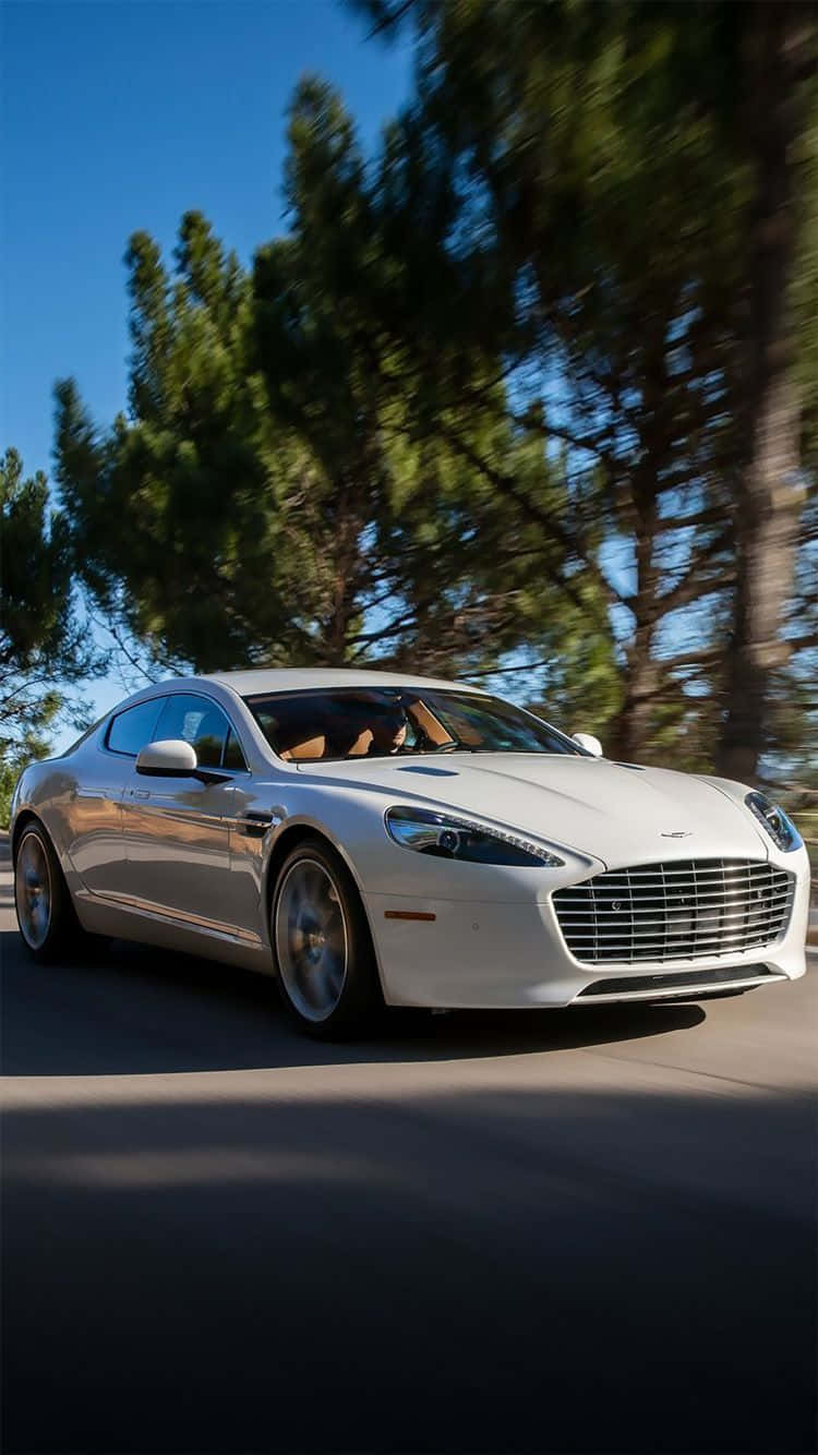 Sleek Aston Martin Rapide S In Motion Wallpaper