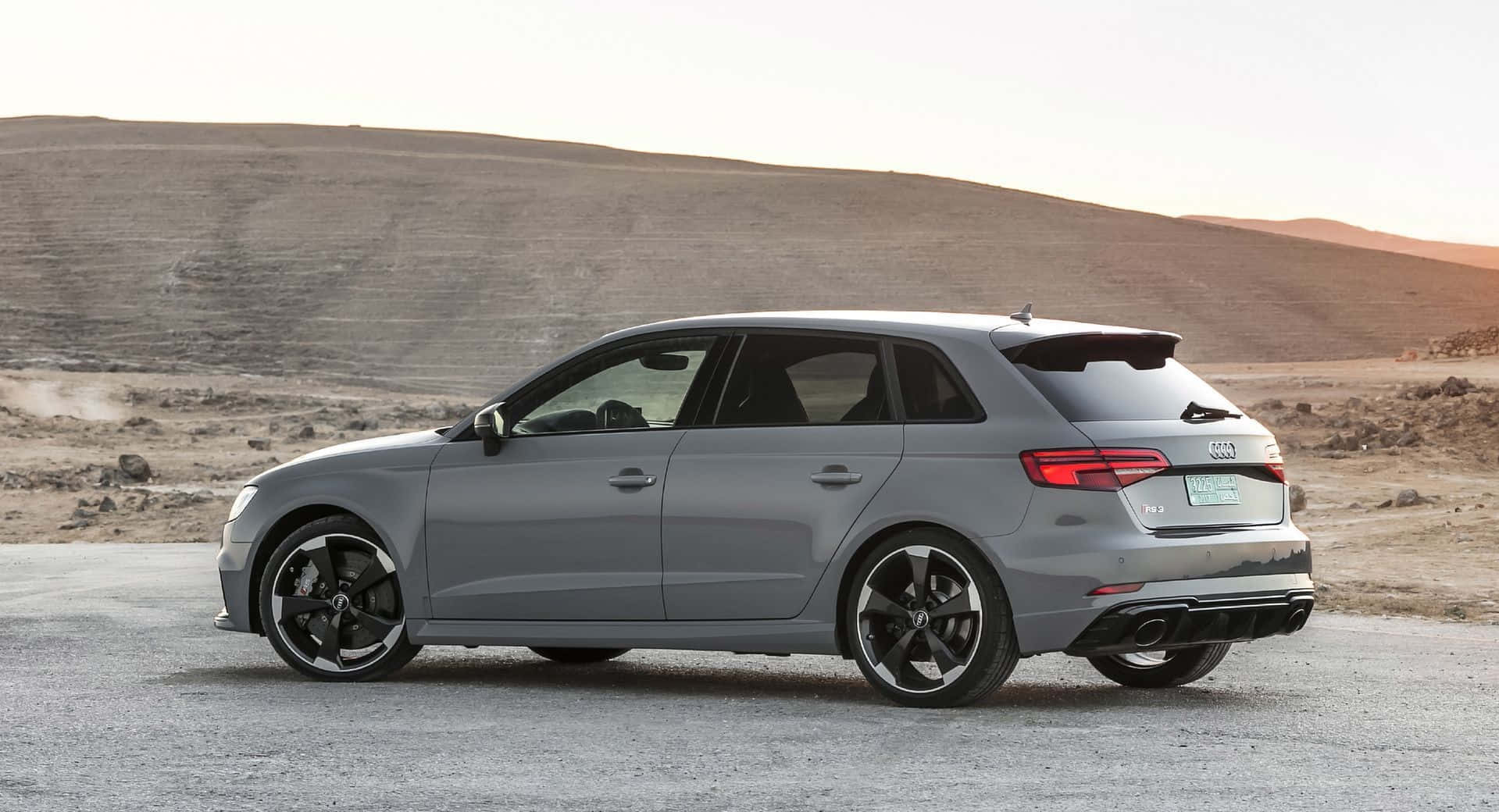 Sleek Audi Rs3 Sportback - Power Meets Luxury Wallpaper