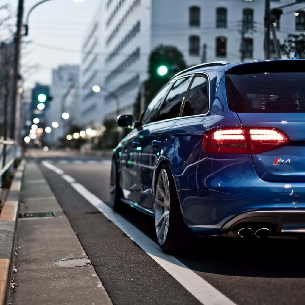 Sleek Audi S4 In Motion Wallpaper