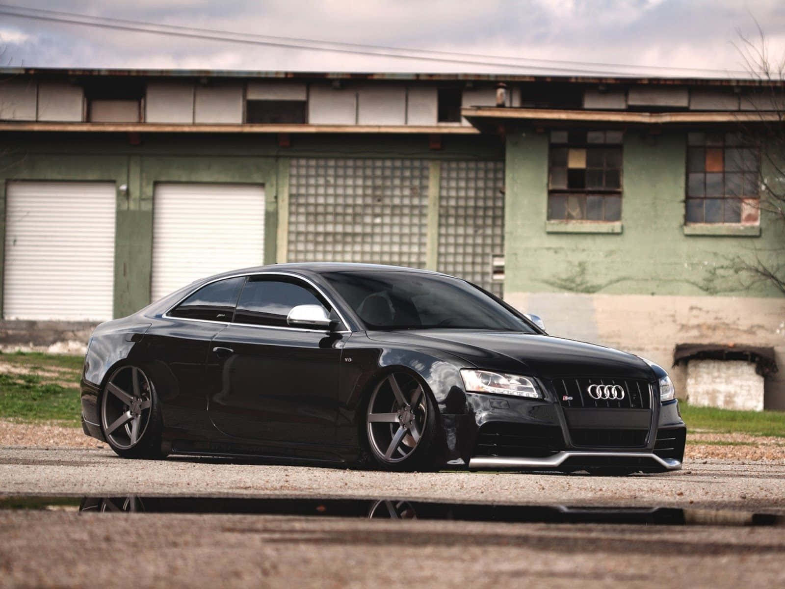 Sleek Audi S5 In Motion Wallpaper