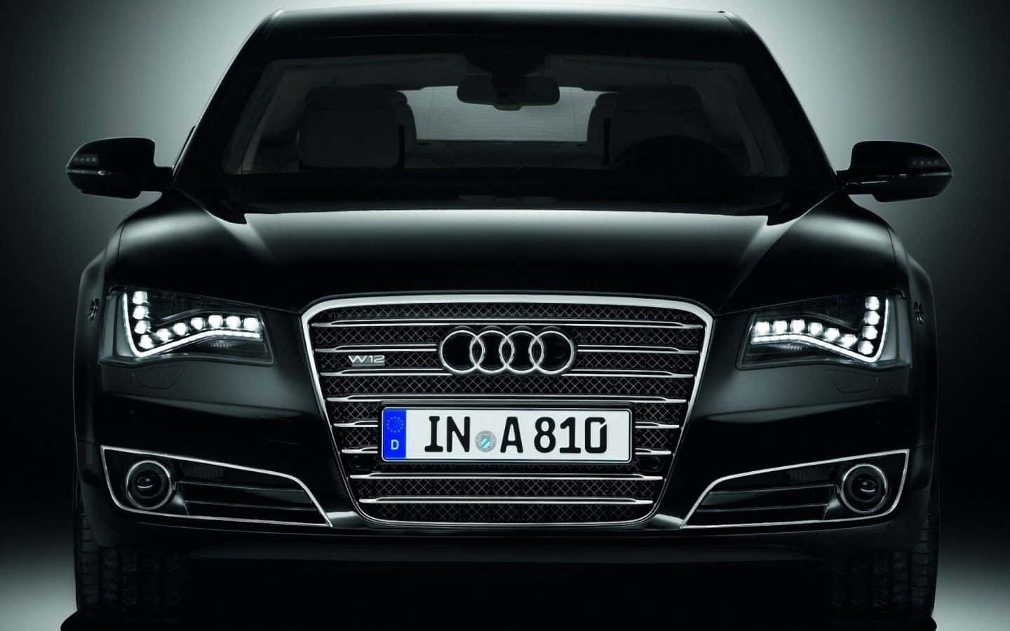 Sleek Audi S8 On The Road Wallpaper