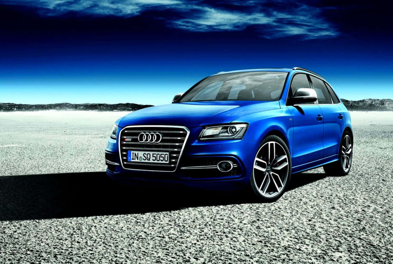 Sleek Audi Sq5 In A Picturesque Landscape Wallpaper