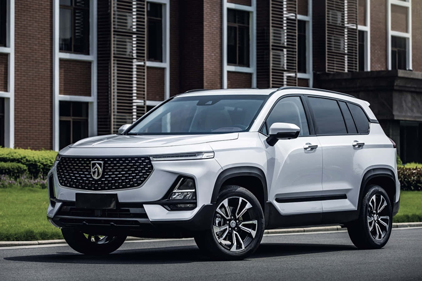 Sleek Baojun Vehicle On A Scenic Mountain Backdrop Wallpaper