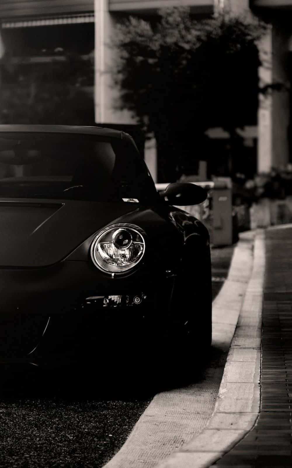 Sleek Black And White Car In Monochrome Wallpaper