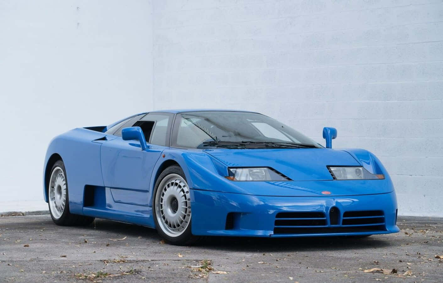 Sleek Bugatti Eb110 Sports Car In Motion Wallpaper