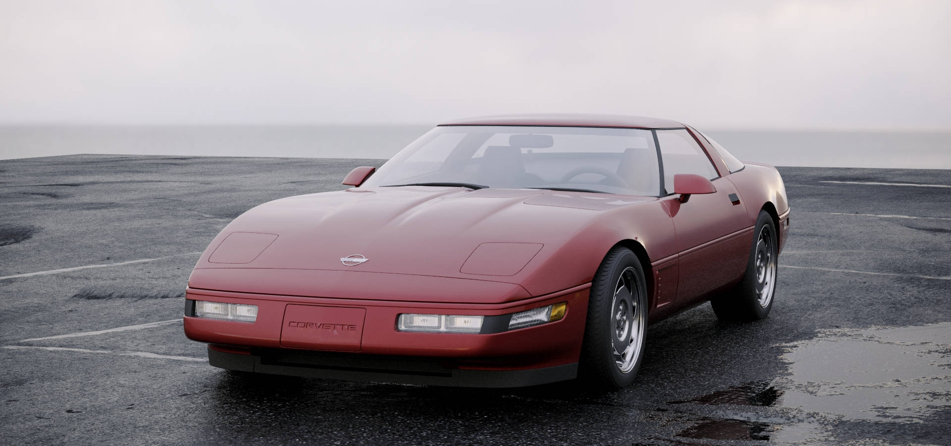 Sleek C4 Corvette Gliding On Wet Pavement Wallpaper