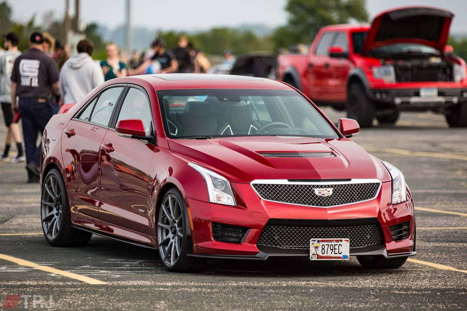 Sleek Cadillac Ats On The Road Wallpaper