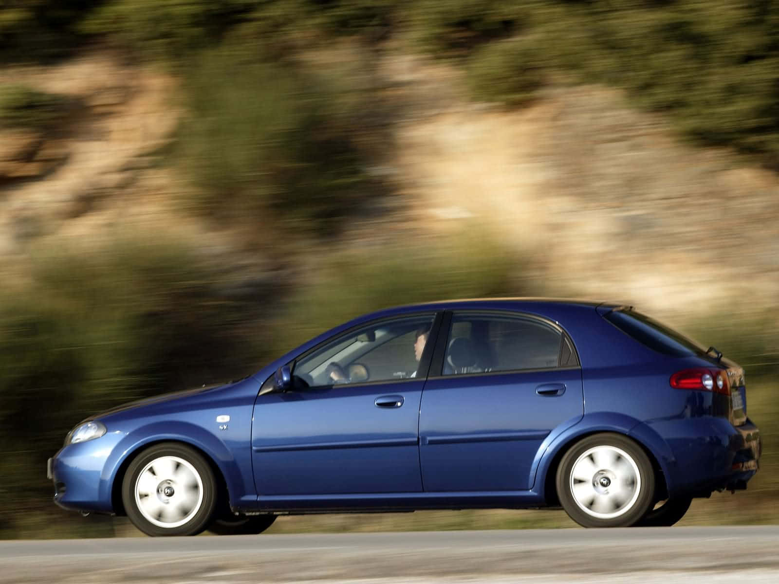 Sleek Design Of Daewoo Lacetti In Silver. Wallpaper