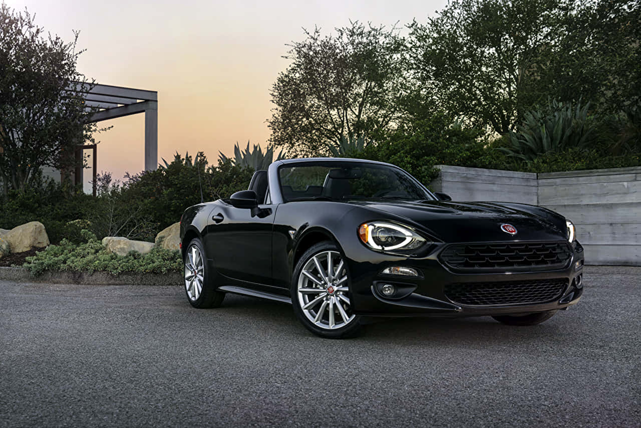 Sleek Fiat 124 Spider Convertible Wallpaper