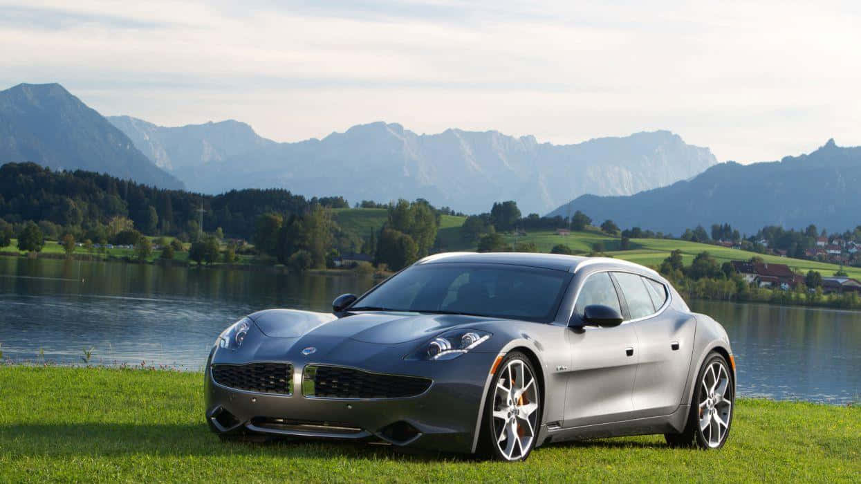 Sleek Fisker Electric Vehicle On The Open Road Wallpaper