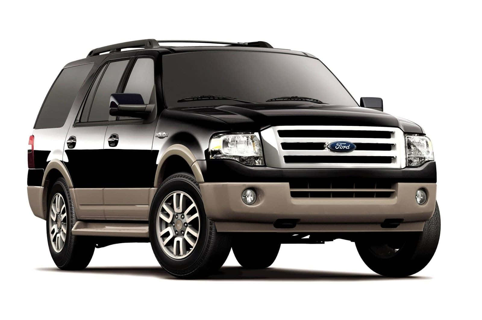 Sleek Ford Expedition Cruising In A Picturesque Landscape Wallpaper