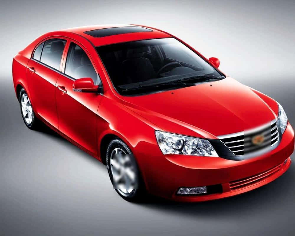 Sleek Geely Sedan Gliding On The Highway Wallpaper