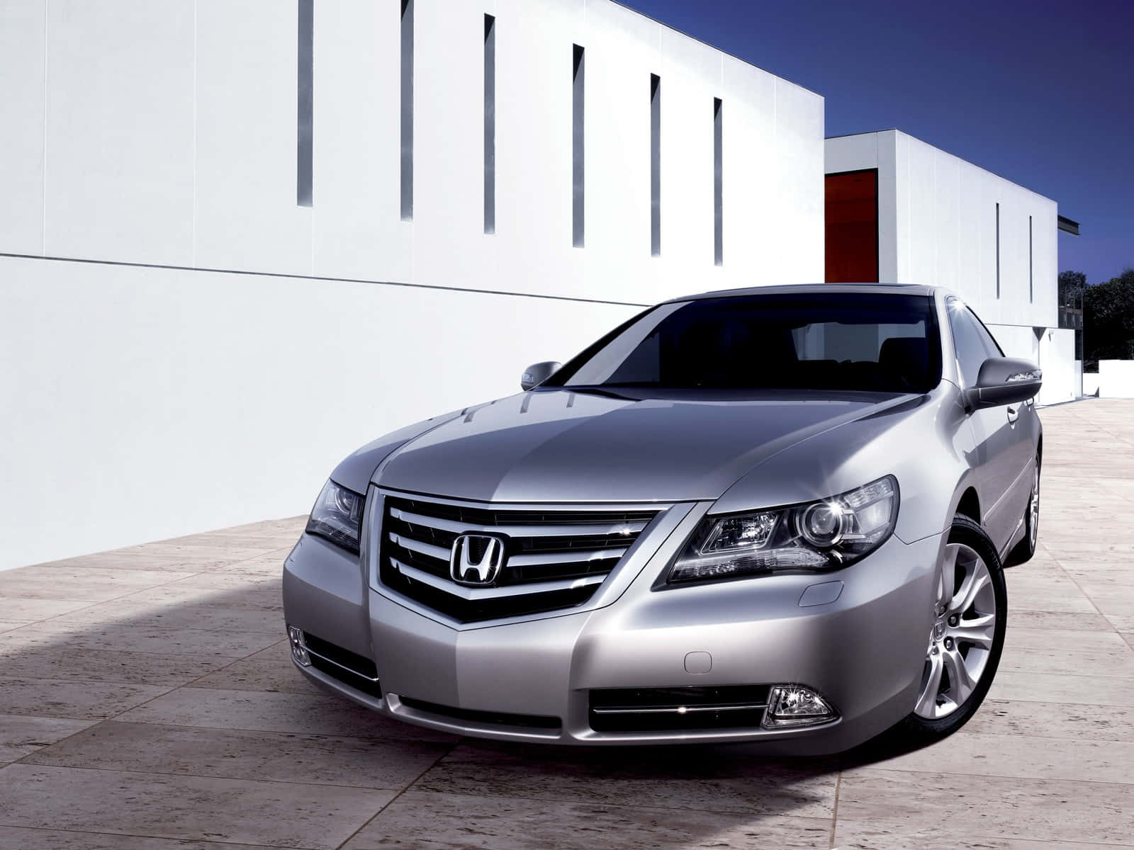 Sleek Honda Legend Cruising On The Highway Wallpaper