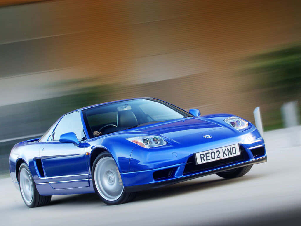 Sleek Honda Nsx In Action Wallpaper