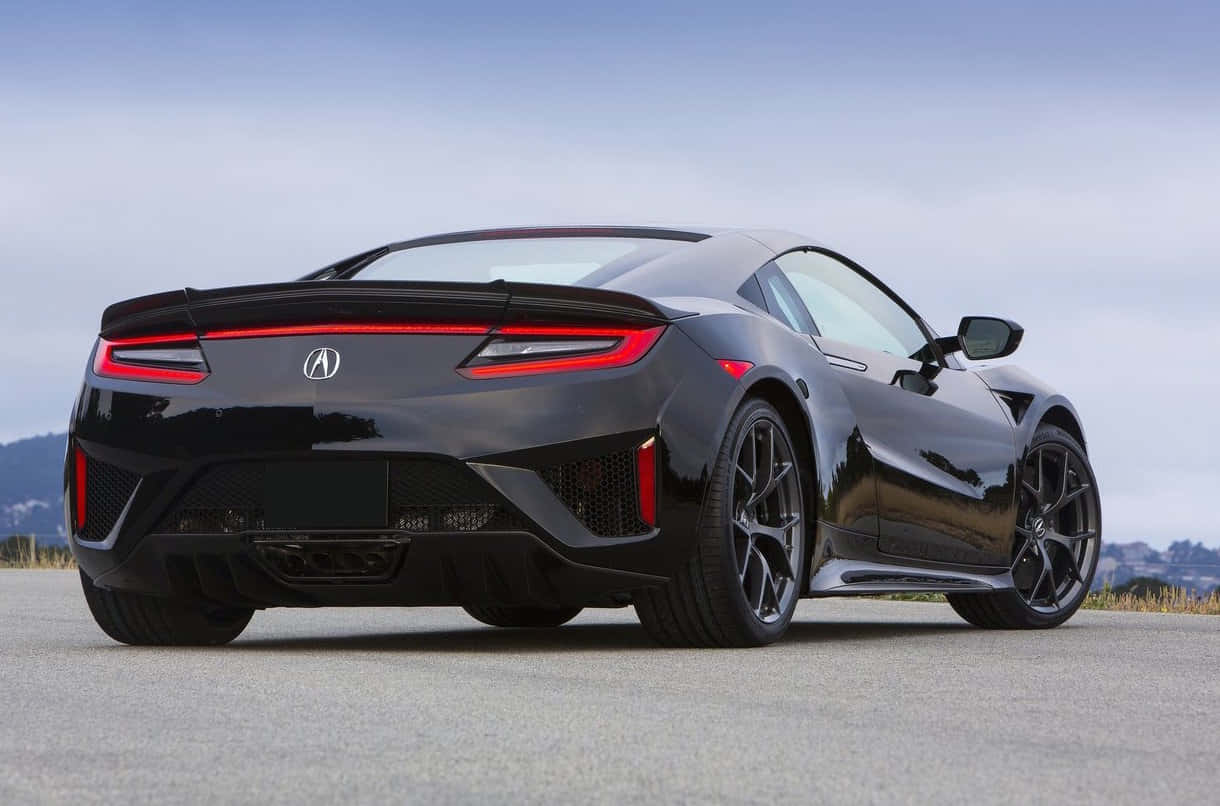 Sleek Honda Nsx Sports Car In Action Wallpaper