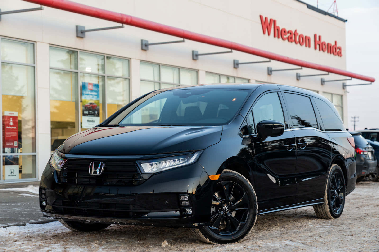 Sleek Honda Odyssey Minivan In Motion Wallpaper