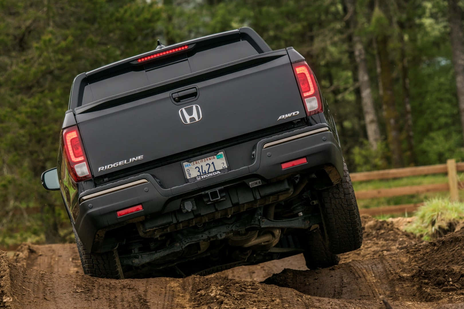 Sleek Honda Ridgeline On A Scenic Road Wallpaper