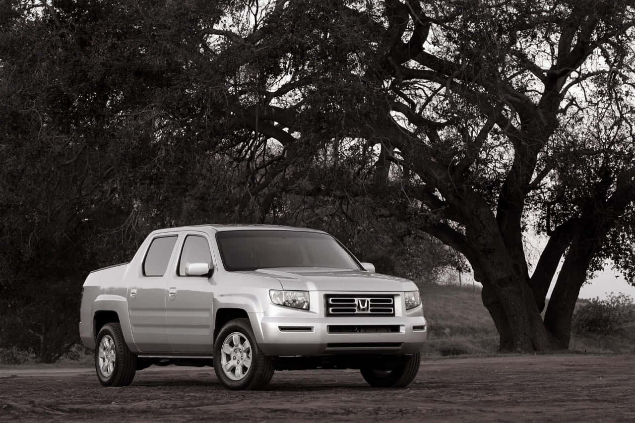 Sleek Honda Ridgeline On The Road Wallpaper