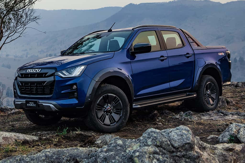 Sleek Isuzu Truck On The Open Road Wallpaper