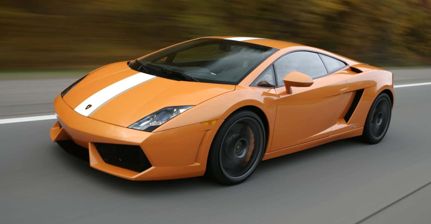 Sleek Lamborghini Gallardo On The Road Wallpaper