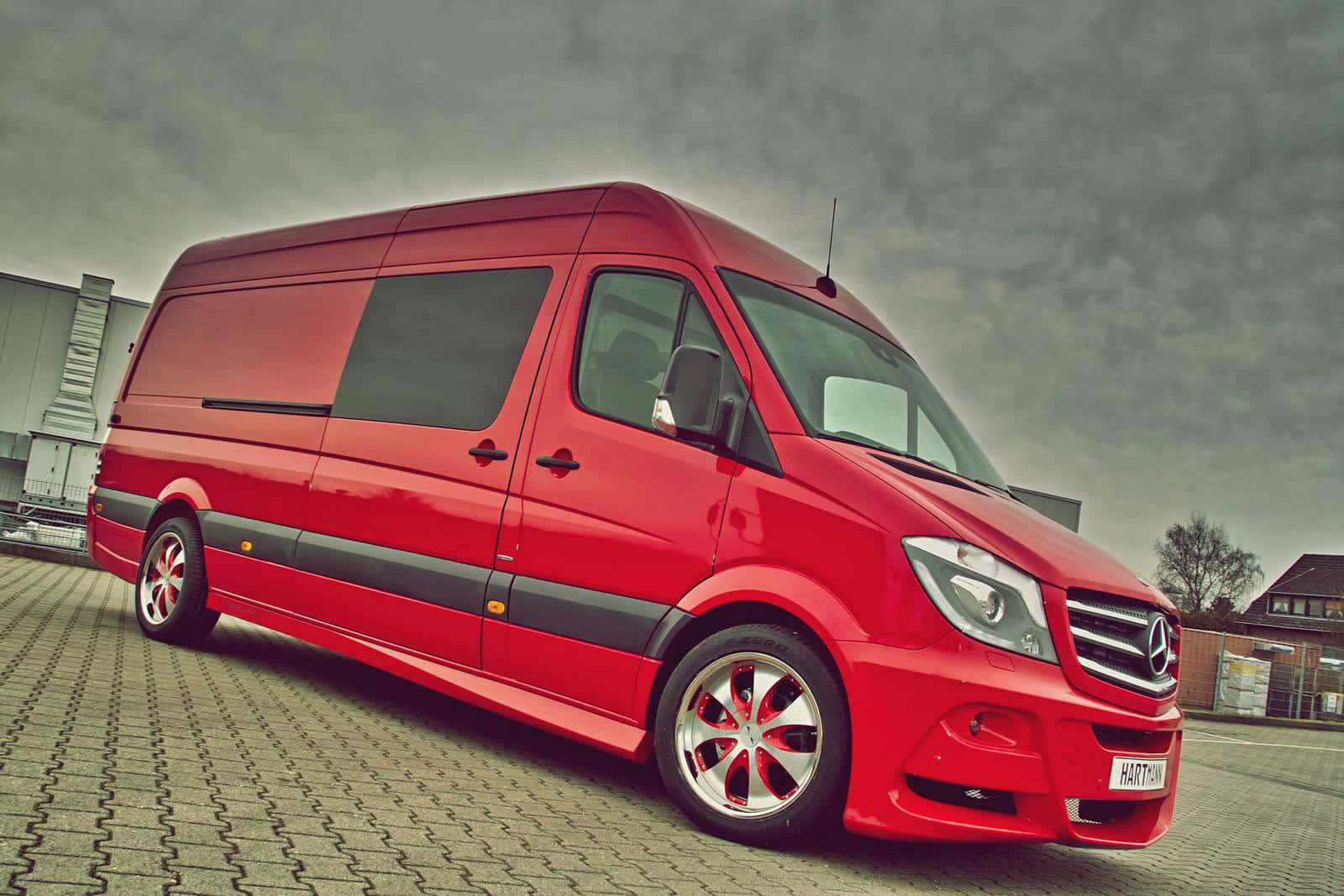 Sleek Mercedes Benz Sprinter On The Move Wallpaper