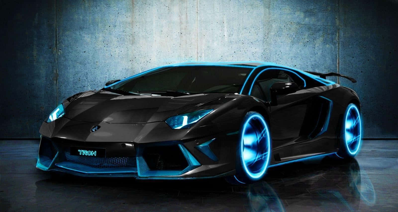 Sleek Modified Car Showcased At Night Wallpaper