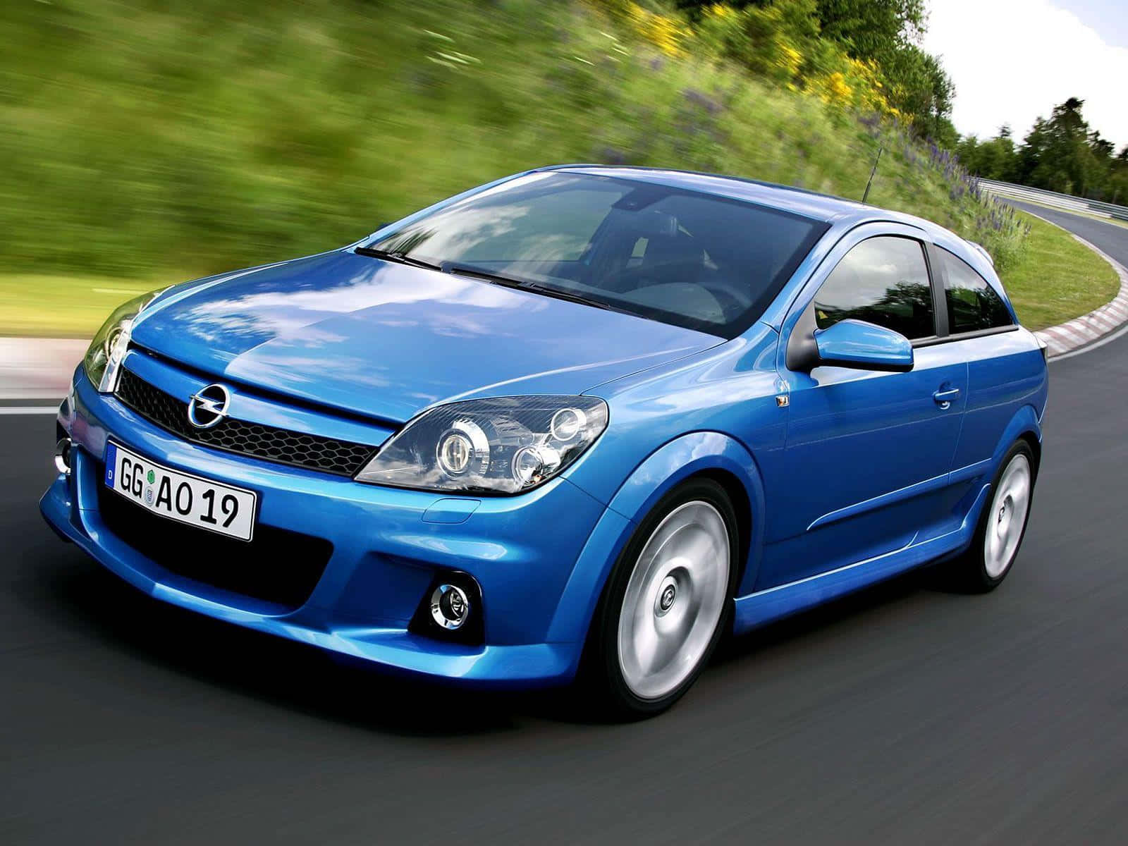 Sleek Opel Astra In Motion Wallpaper