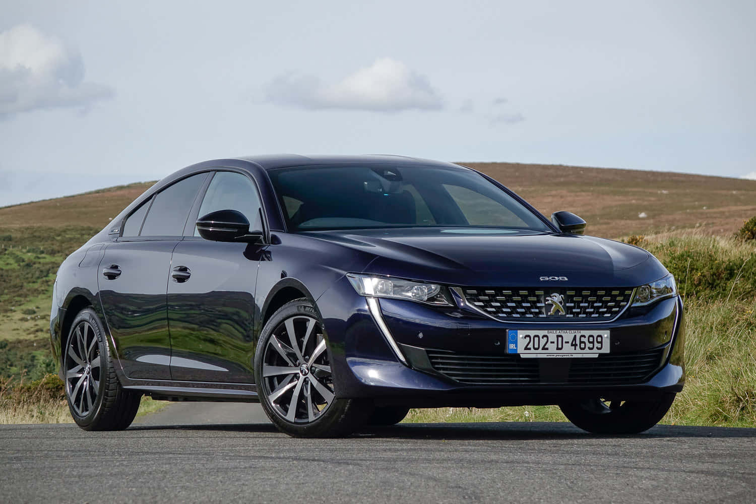 Sleek Peugeot 508 In Outdoor Setting Wallpaper