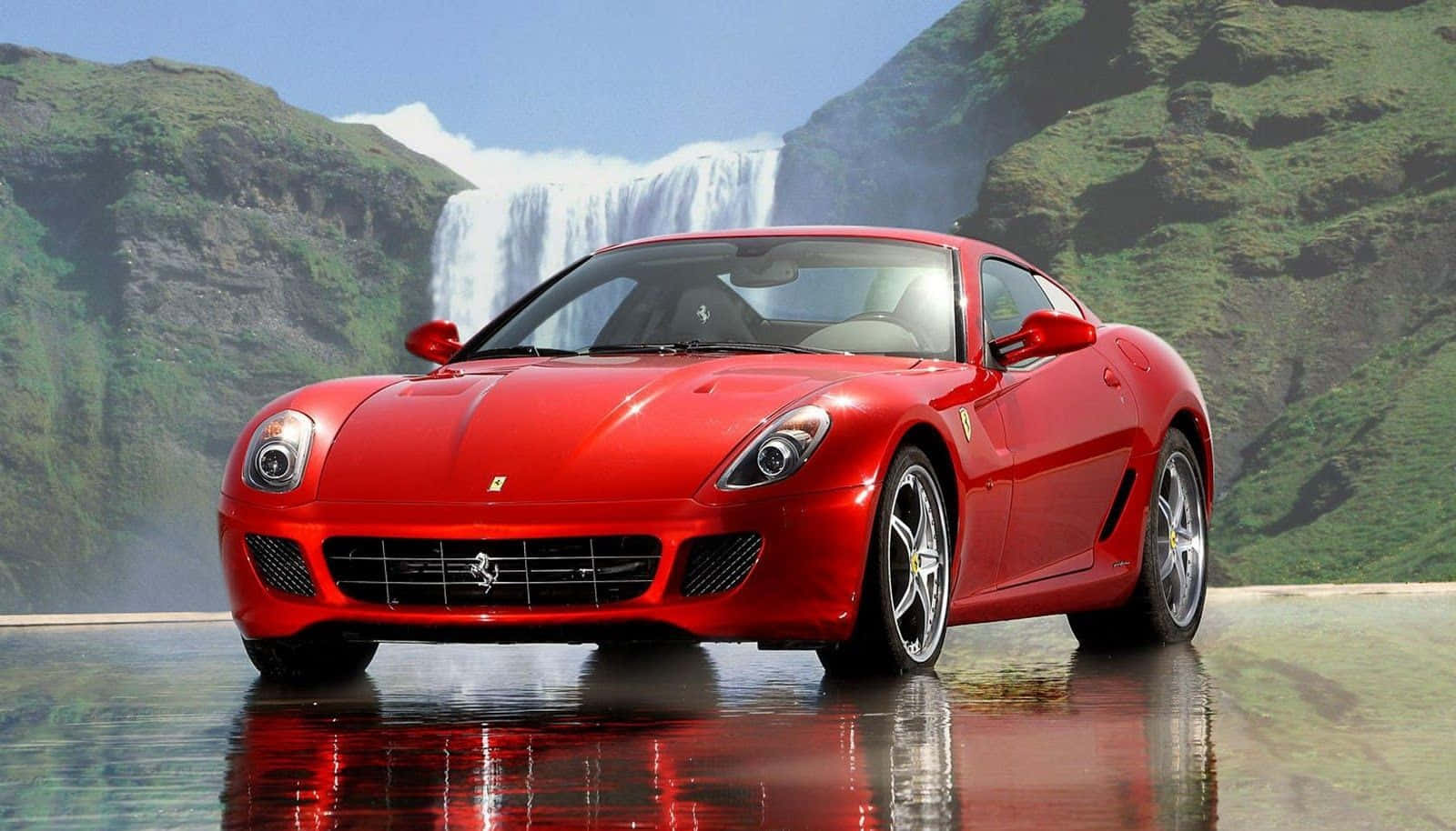 Sleek Red Ferrari 599 Gtb Fiorano On The Road Wallpaper