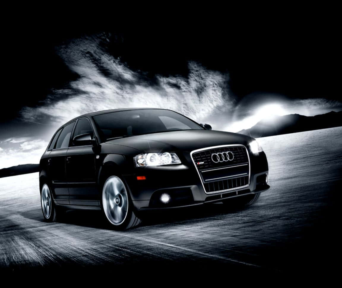 Sleek Silver Audi S3 In Motion On The Road Wallpaper