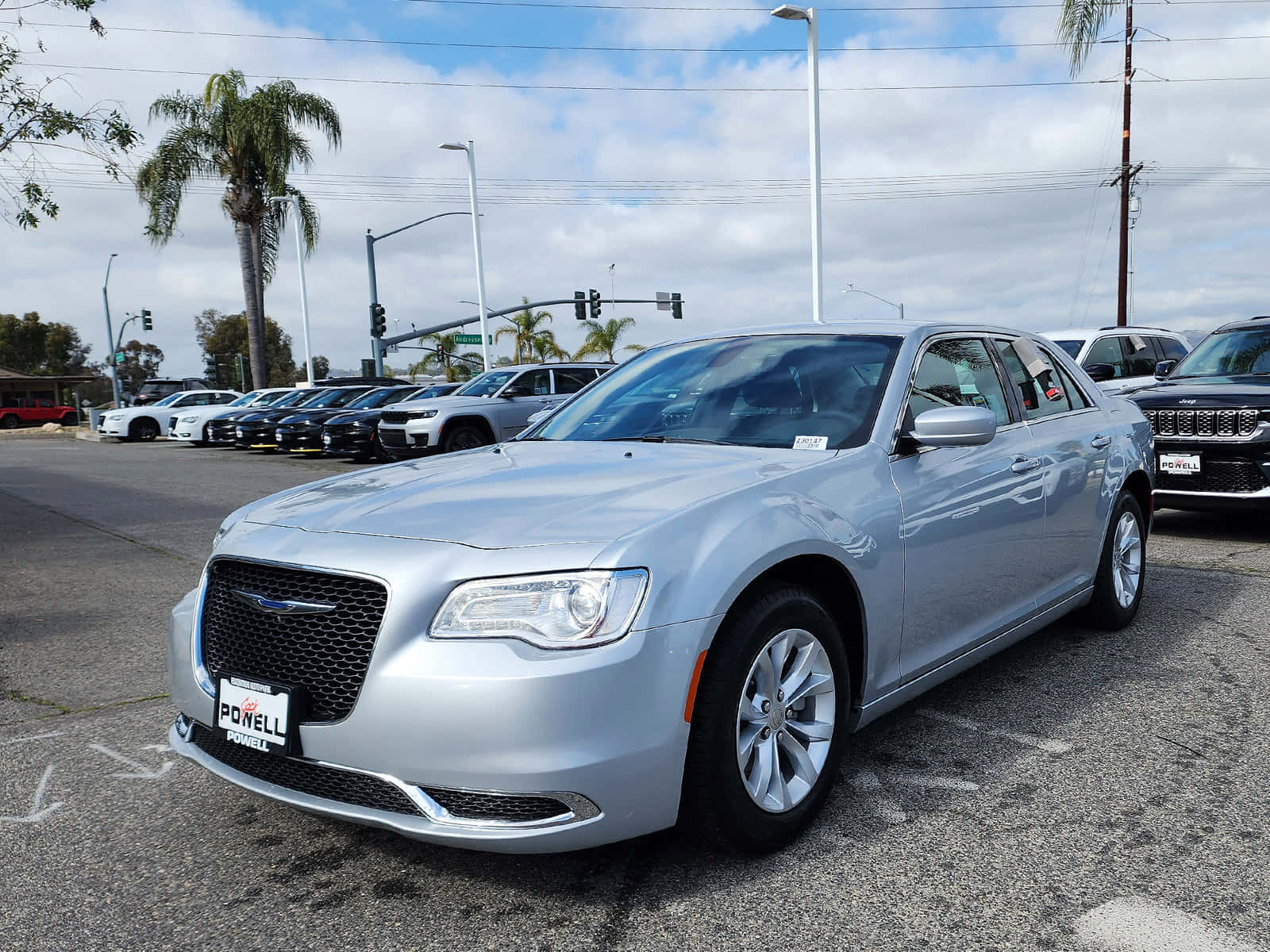 Sleek Silver Chrysler 300 On Display Wallpaper