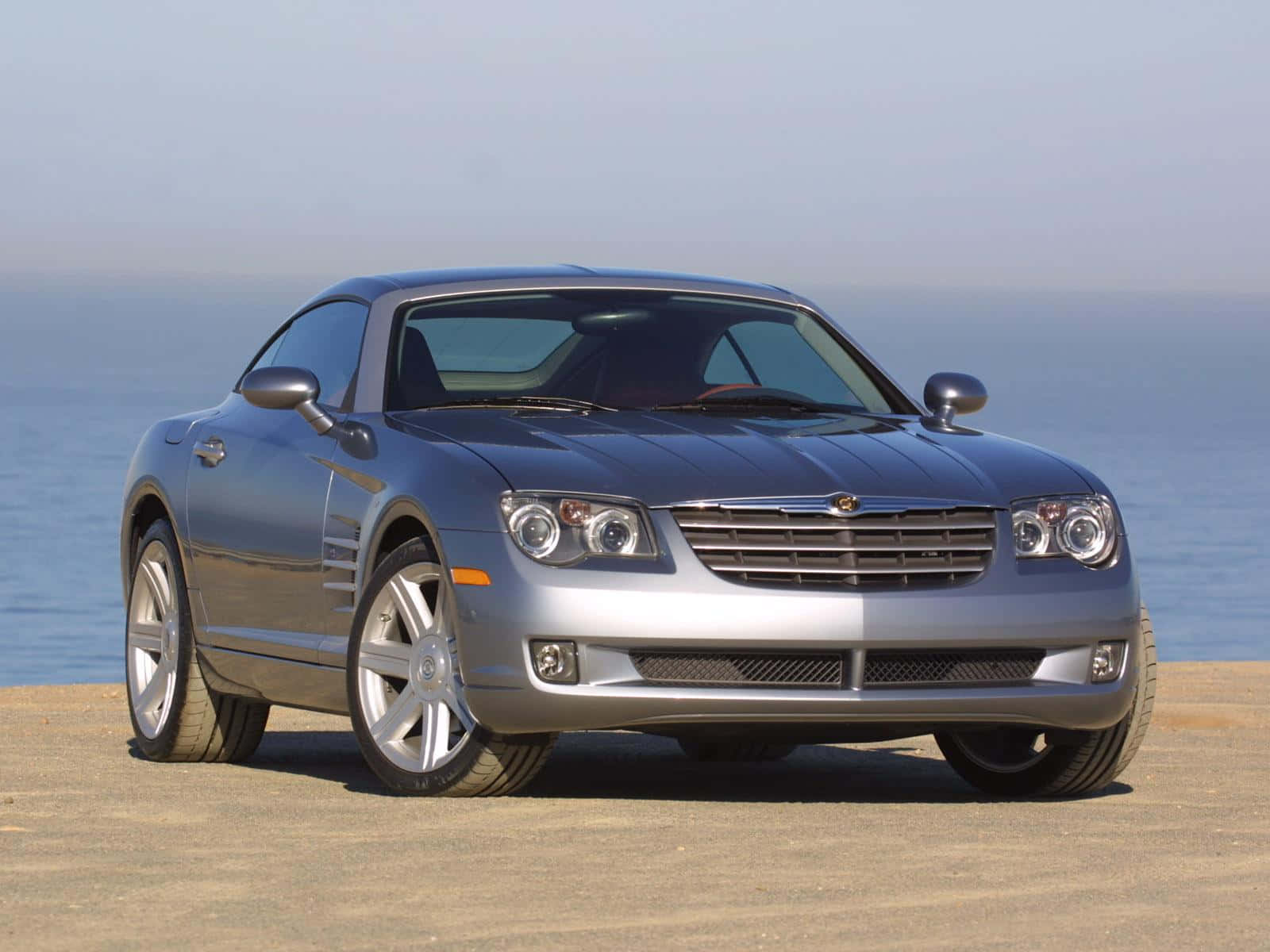 Sleek Silver Chrysler Crossfire Showcasing Its Dynamic Design Wallpaper