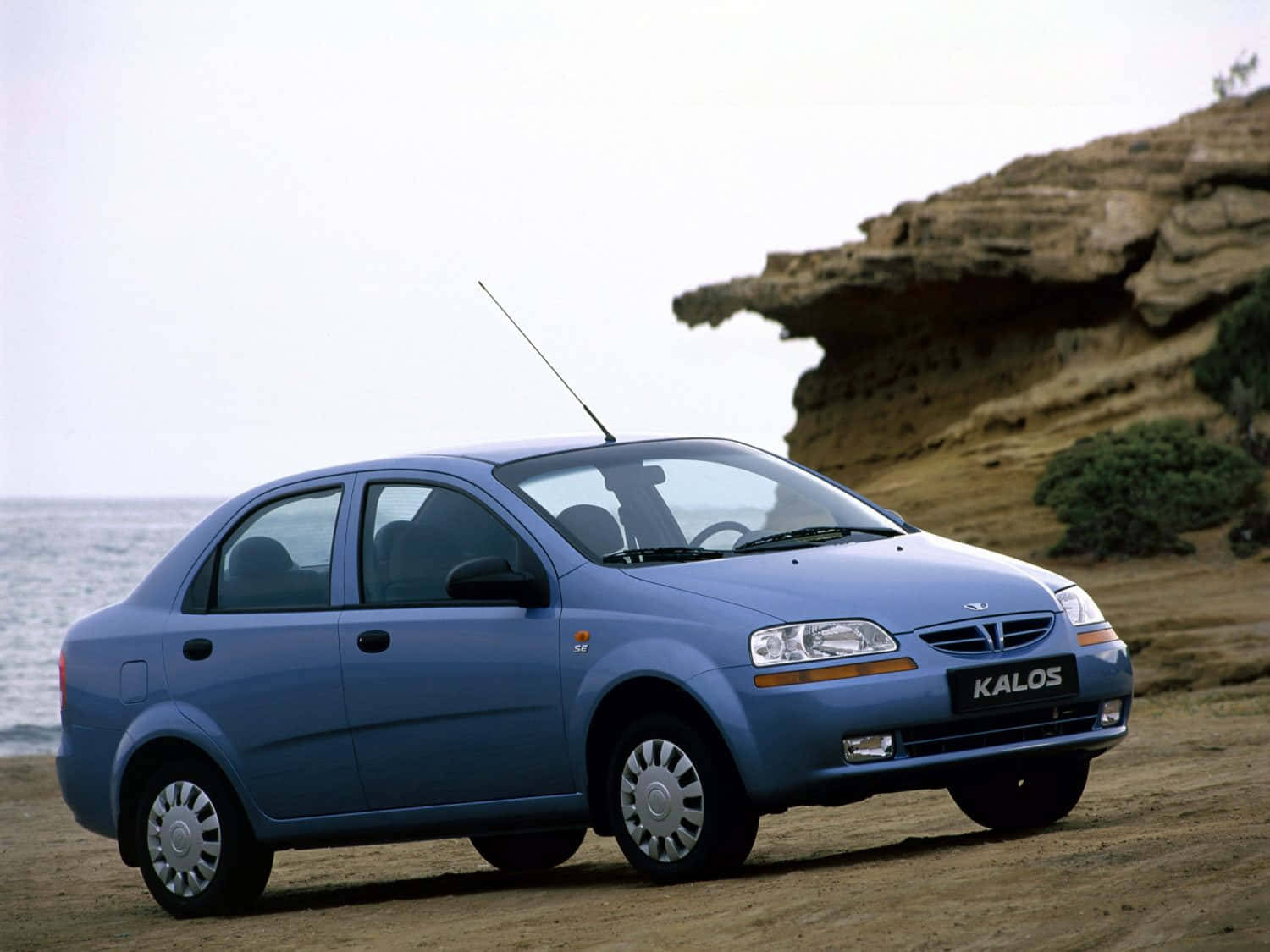 Sleek Silver Daewoo Kalos Parked On The Street Wallpaper