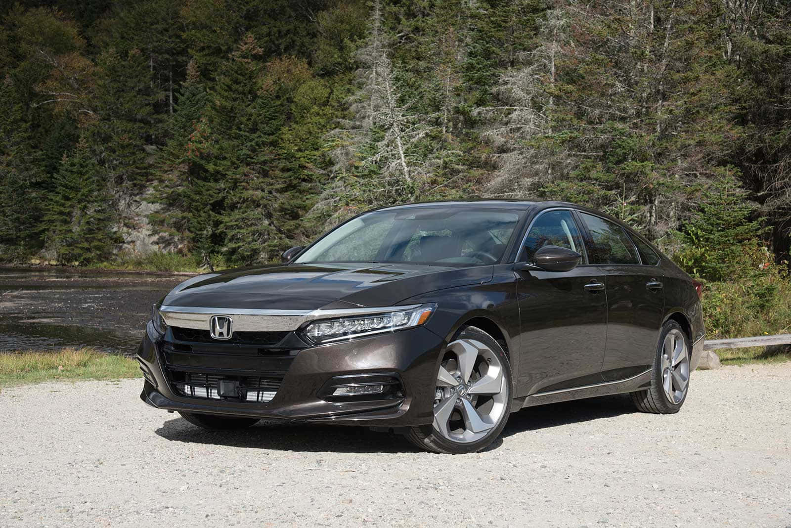 Sleek Silver Honda Accord Parked On Pavement Wallpaper