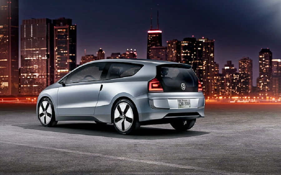 Sleek Silver Volkswagen Up City Car Wallpaper