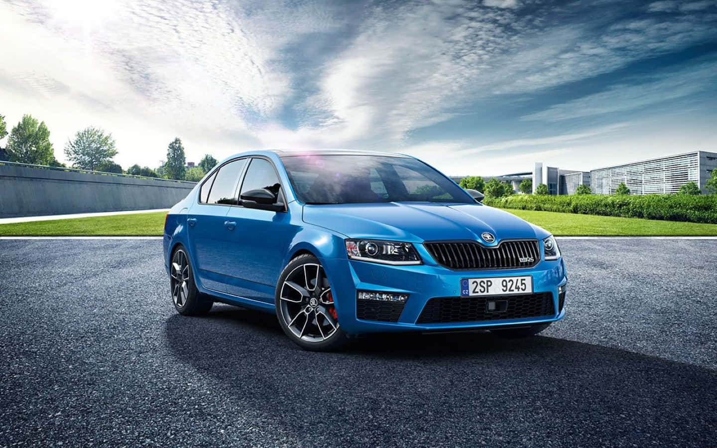 Sleek Skoda Rapid Cruising The Open Road Wallpaper