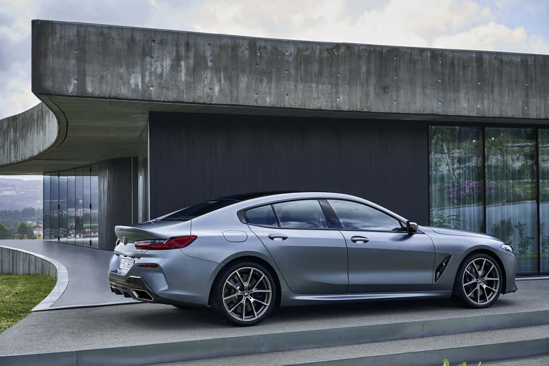 Sleek Sophistication: The Bmw 8 Series In Motion Wallpaper