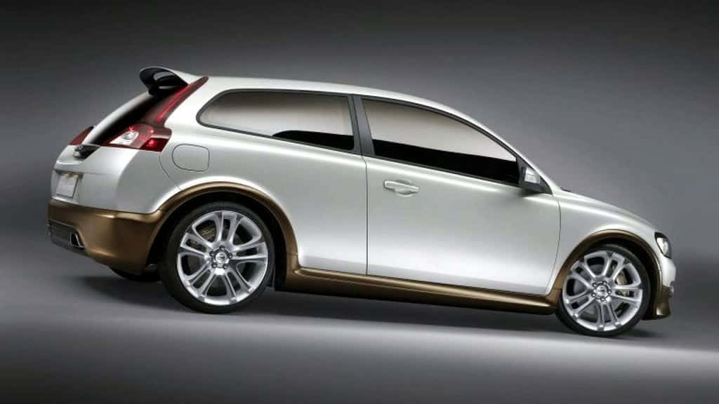 Sleek Volvo C30 Car On High Road Wallpaper