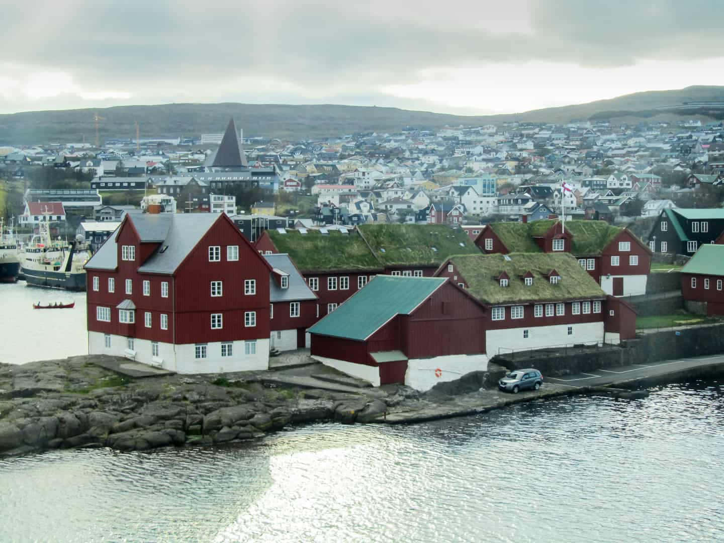 Slightly Foggy Tinganes Peninsula At Thorshavn Wallpaper