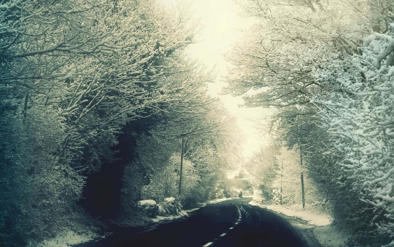 Slippery Icy Road In Winter Season Wallpaper