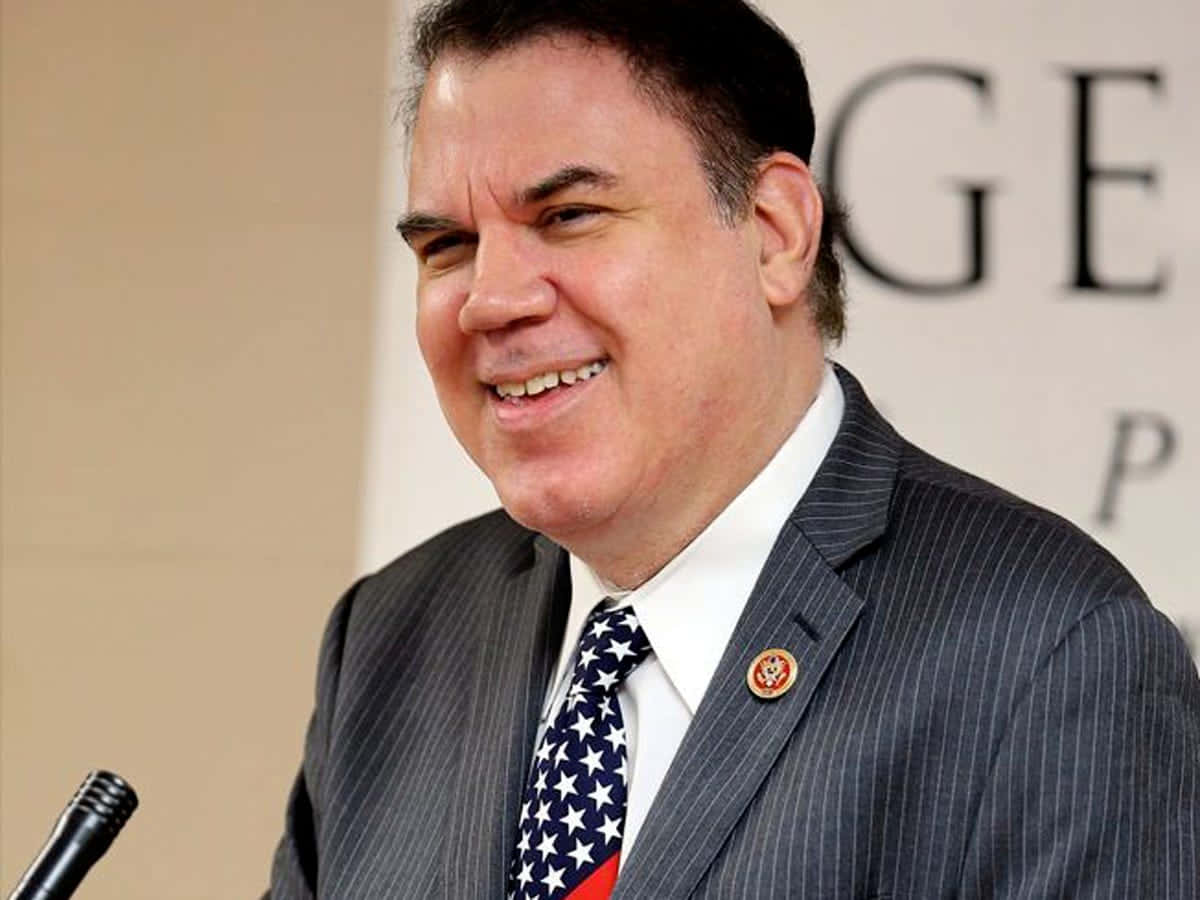 Smiling Alan Grayson Speaker Wallpaper