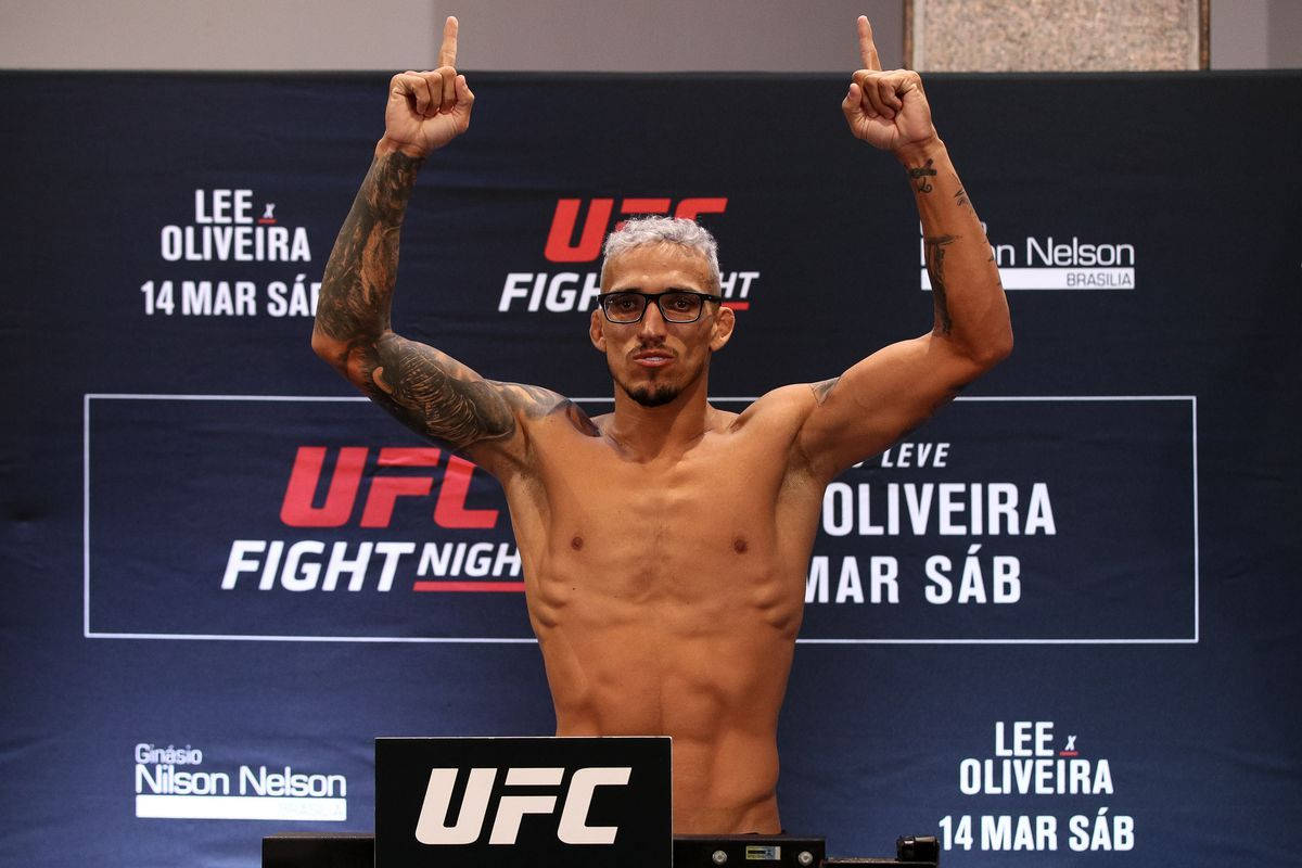 Smiling Charles Oliveira Wearing Glasses Wallpaper