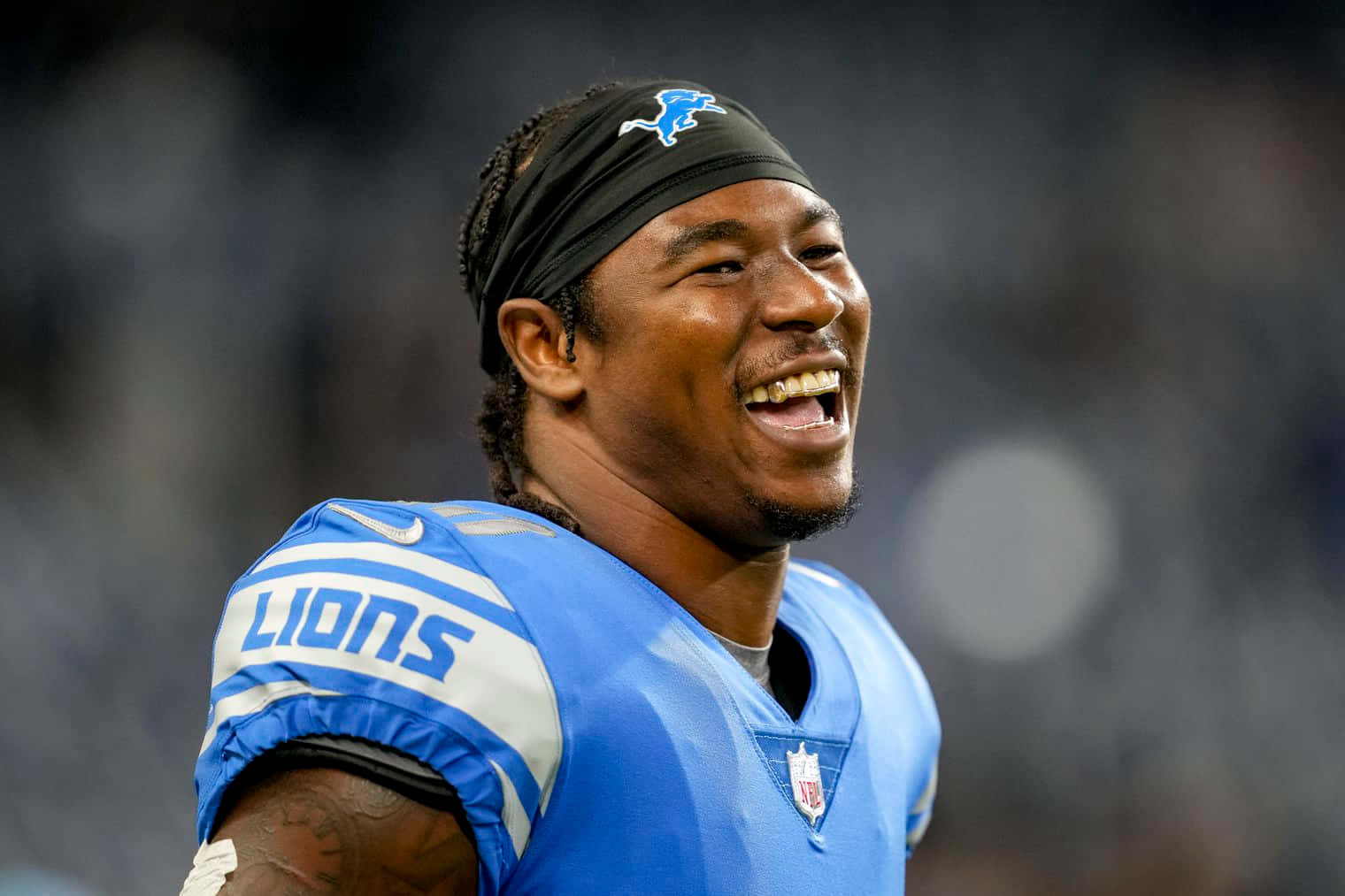 Smiling Football Player Detroit Lions Uniform Wallpaper