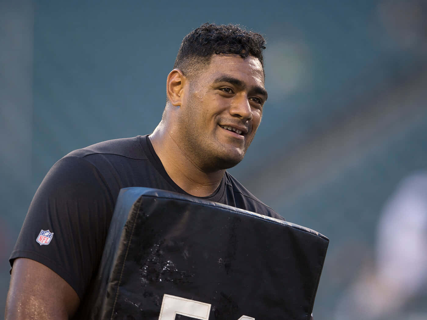 Smiling Football Player Jordan Mailata Wallpaper