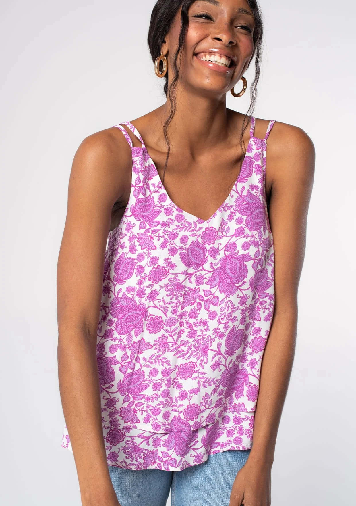 Smiling Womanin Purple Floral Tank Top Wallpaper